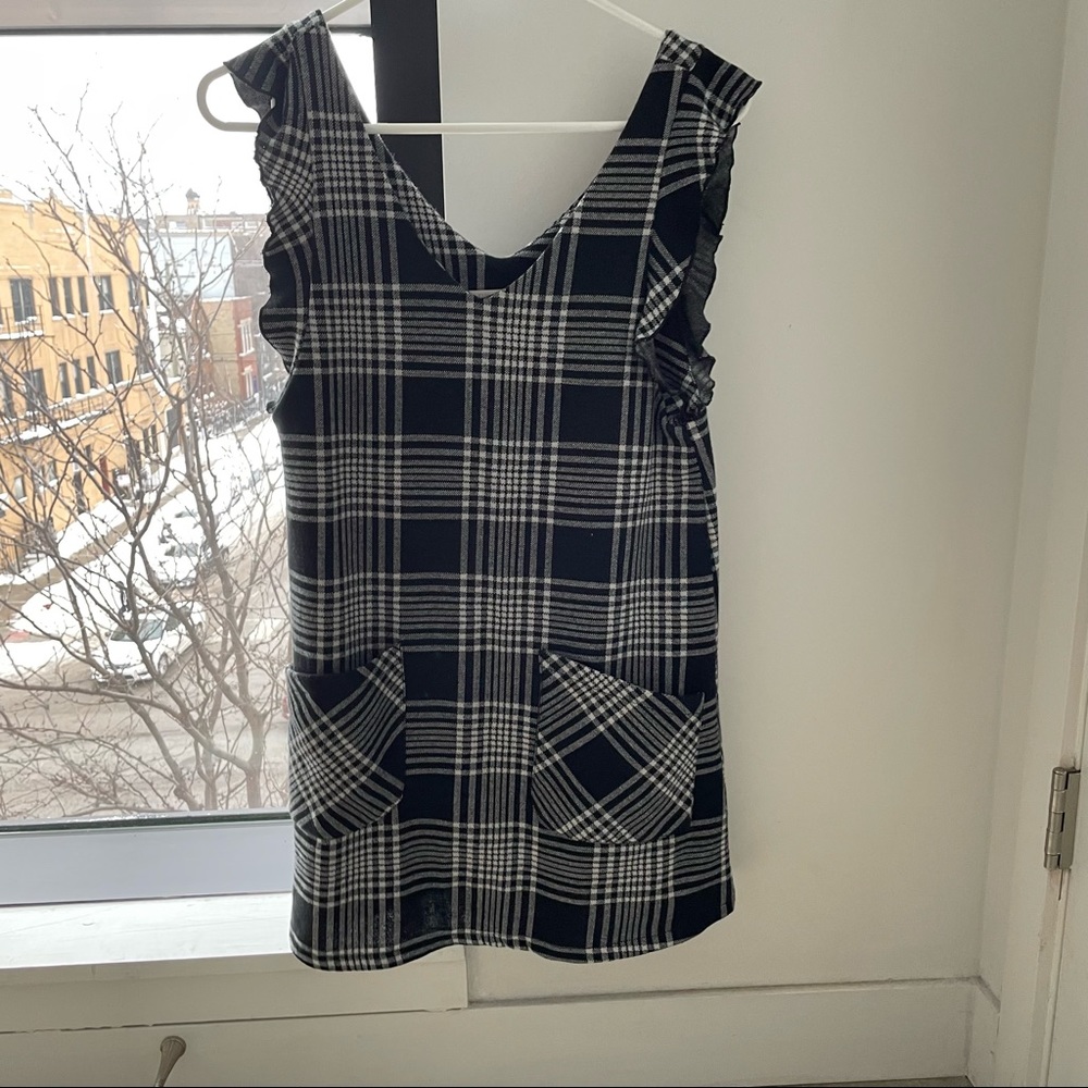 Black and white sleeveless plaid dress